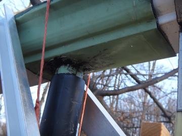 gutter downspout made from roofing